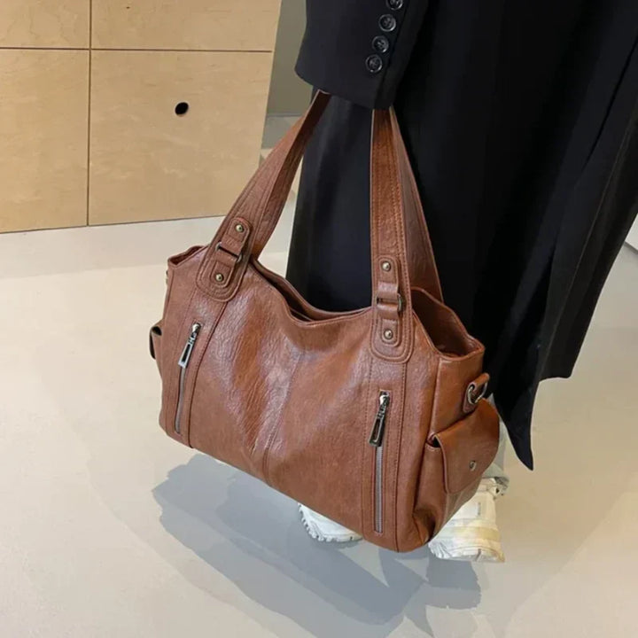 Dakota Torebka Damska na Ramię – Elegancka Skórzana Torebka z Regulowanym Paskiem i Przestronnym Designem