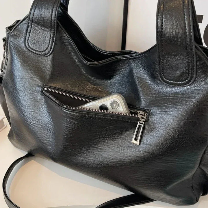 Dakota Torebka Damska na Ramię – Elegancka Skórzana Torebka z Regulowanym Paskiem i Przestronnym Designem