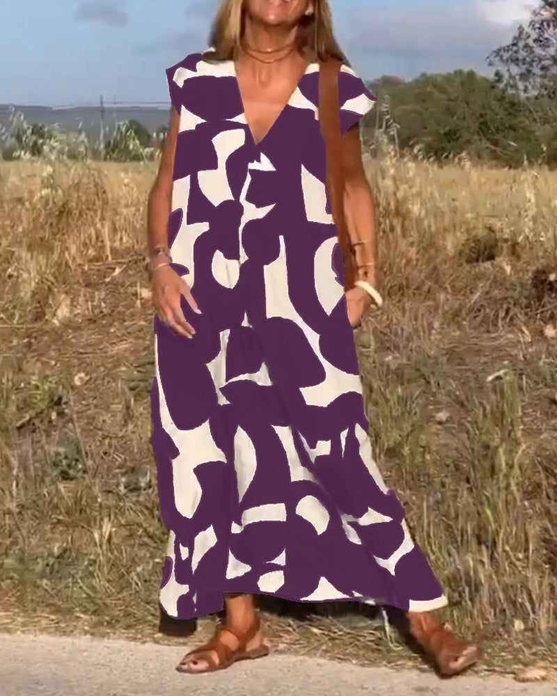 Maxine Damska Sukienka Maxi – Zwiewna Letnia Sukienka z Dekoltem w Serek, Nadrukiem i Fasonem w Kształcie Litery A
