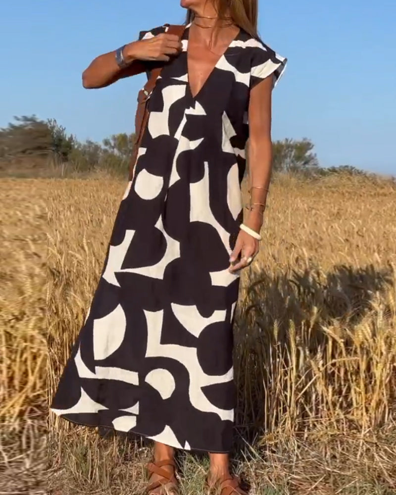 Maxine Damska Sukienka Maxi – Zwiewna Letnia Sukienka z Dekoltem w Serek, Nadrukiem i Fasonem w Kształcie Litery A