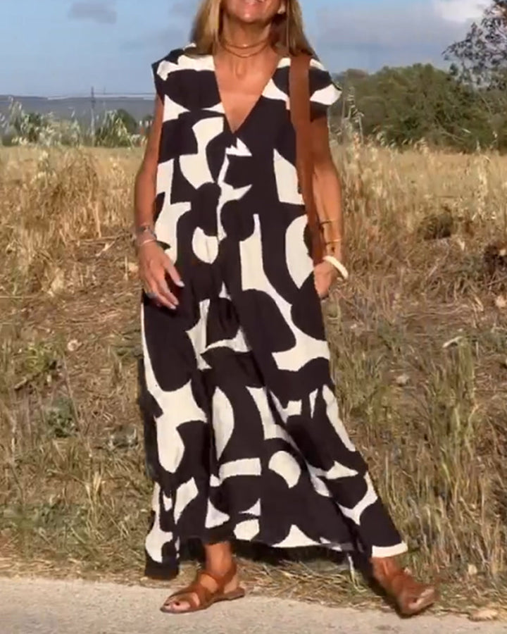 Maxine Damska Sukienka Maxi – Zwiewna Letnia Sukienka z Dekoltem w Serek, Nadrukiem i Fasonem w Kształcie Litery A