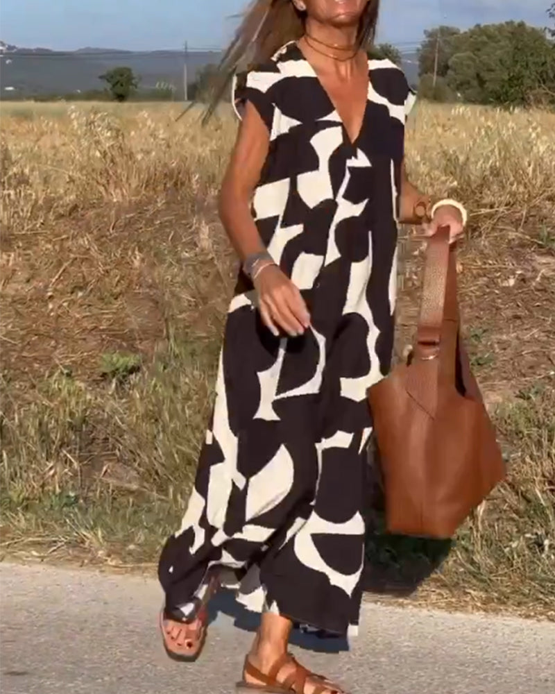 Maxine Damska Sukienka Maxi – Zwiewna Letnia Sukienka z Dekoltem w Serek, Nadrukiem i Fasonem w Kształcie Litery A