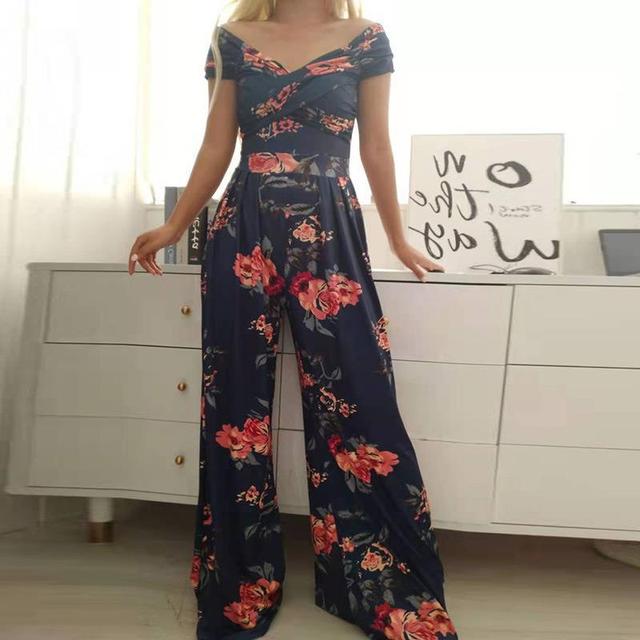 Kombinezon Lilibeth Damski – Elegancki kombinezon z odkrytymi ramionami, szerokimi nogawkami i paskiem