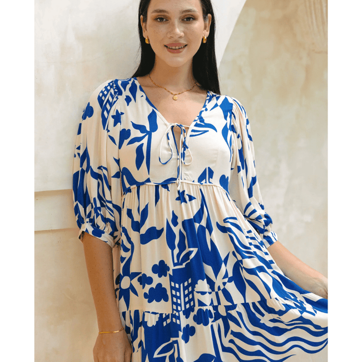 Runa Sukienka Midi Looksy – Kwiatowy wzór i lekkie bufiaste rękawy na lato