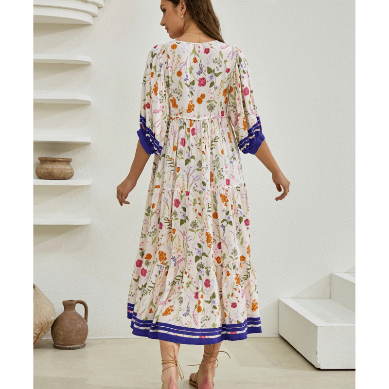 Runa Sukienka Midi Looksy – Kwiatowy wzór i lekkie bufiaste rękawy na lato