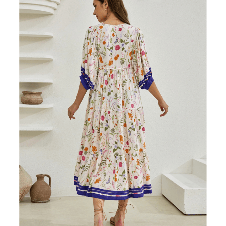 Runa Sukienka Midi Looksy – Kwiatowy wzór i lekkie bufiaste rękawy na lato