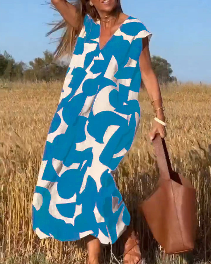 Maxine Damska Sukienka Maxi – Zwiewna Letnia Sukienka z Dekoltem w Serek, Nadrukiem i Fasonem w Kształcie Litery A