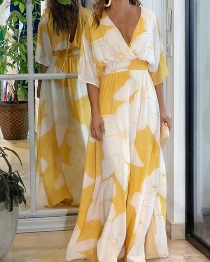 Sukienka Damska Calypso – Elegancka Sukienka w Kwiaty z Kontrastowymi Detalami i Kobiecym Krojem