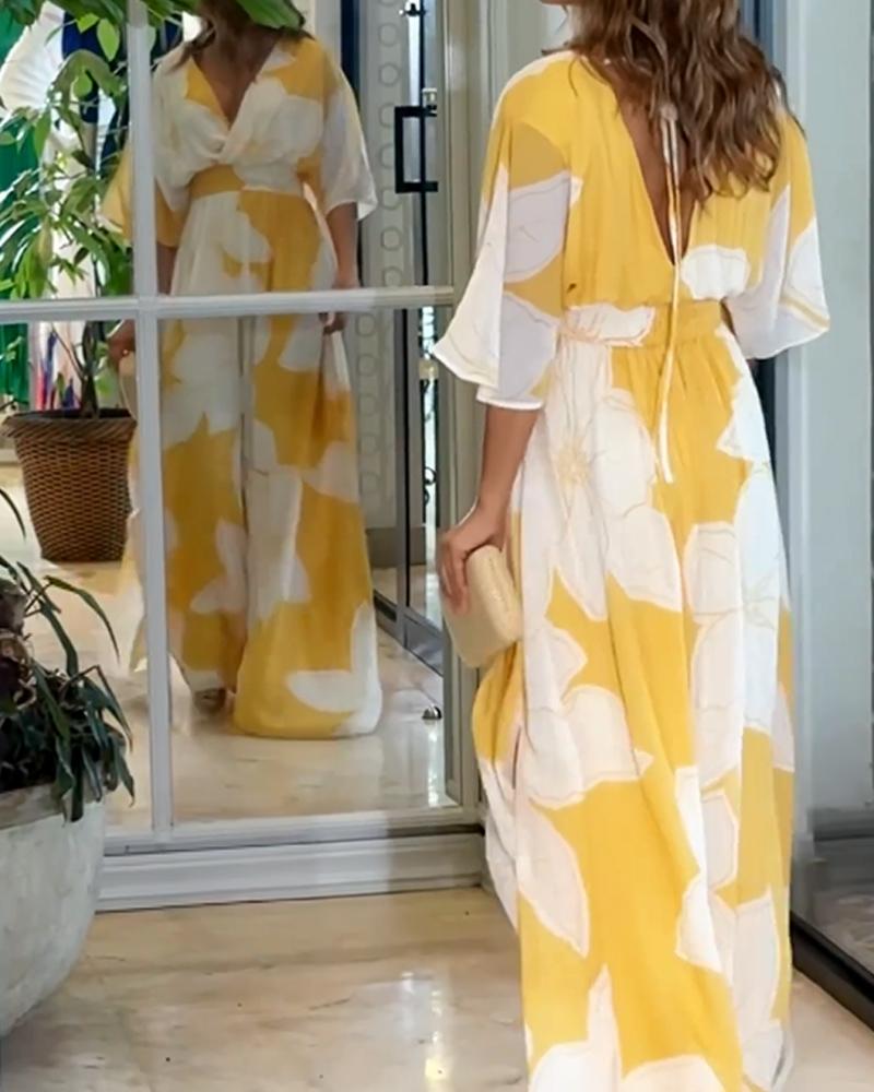 Sukienka Damska Calypso – Elegancka Sukienka w Kwiaty z Kontrastowymi Detalami i Kobiecym Krojem